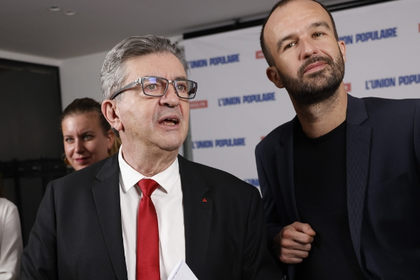 Le candidat de La France insoumise Jean-Luc Mélenchon et son directeur de campagne, Manuel Bompard.